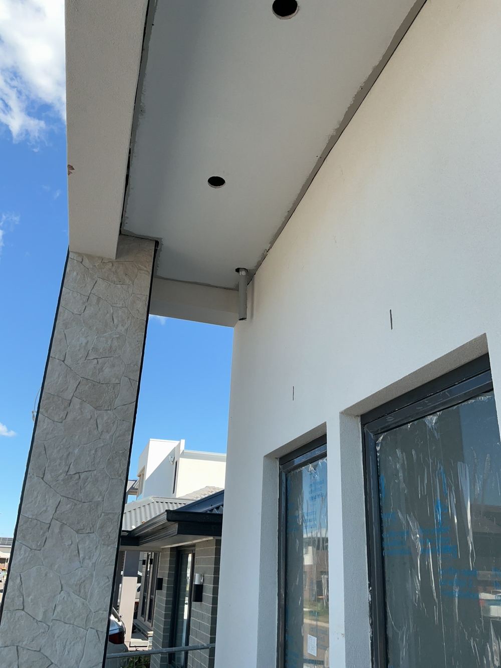 Balcony drainage not installed or connected, found during a fixing stage inspection in Cobbitty
