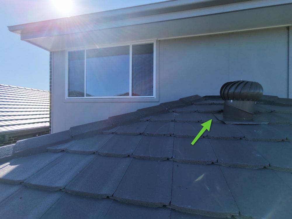 Roof penetration not sealed with proper flashing, found during a handover inspection in Cobbitty